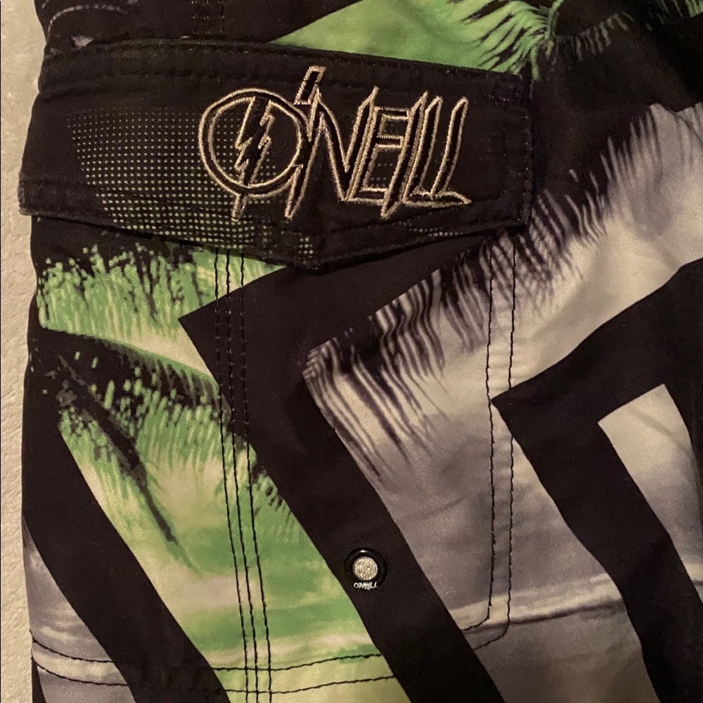 Men’s size 30 O’Neill swimsuit. New without tags.